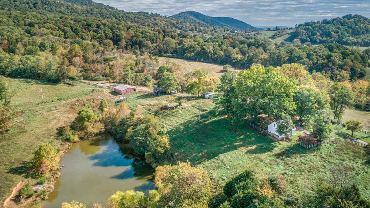 Cedar Glen historic farmhouse and working farm in Bedford County Virginia with rolling farmland